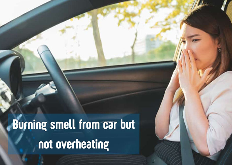burning smell from car but not overheating
