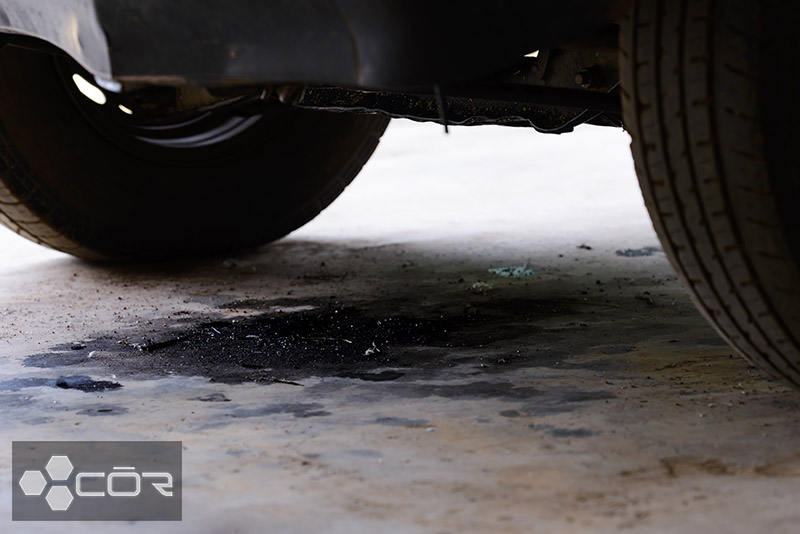 Oil leakage from old car.